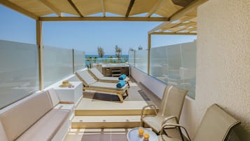 Suite Junior, vue partielle sur la mer | Vue sur la plage/lâocĂ©an