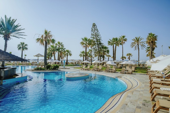 Indoor pool, outdoor pool, pool umbrellas, sun loungers