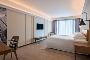 Suite, 1 slaapkamer | Luxe beddengoed, een kluis op de kamer, een laptopwerkplek