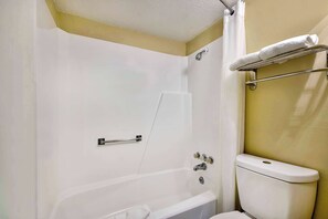 Combined shower/bathtub, hair dryer, towels, soap