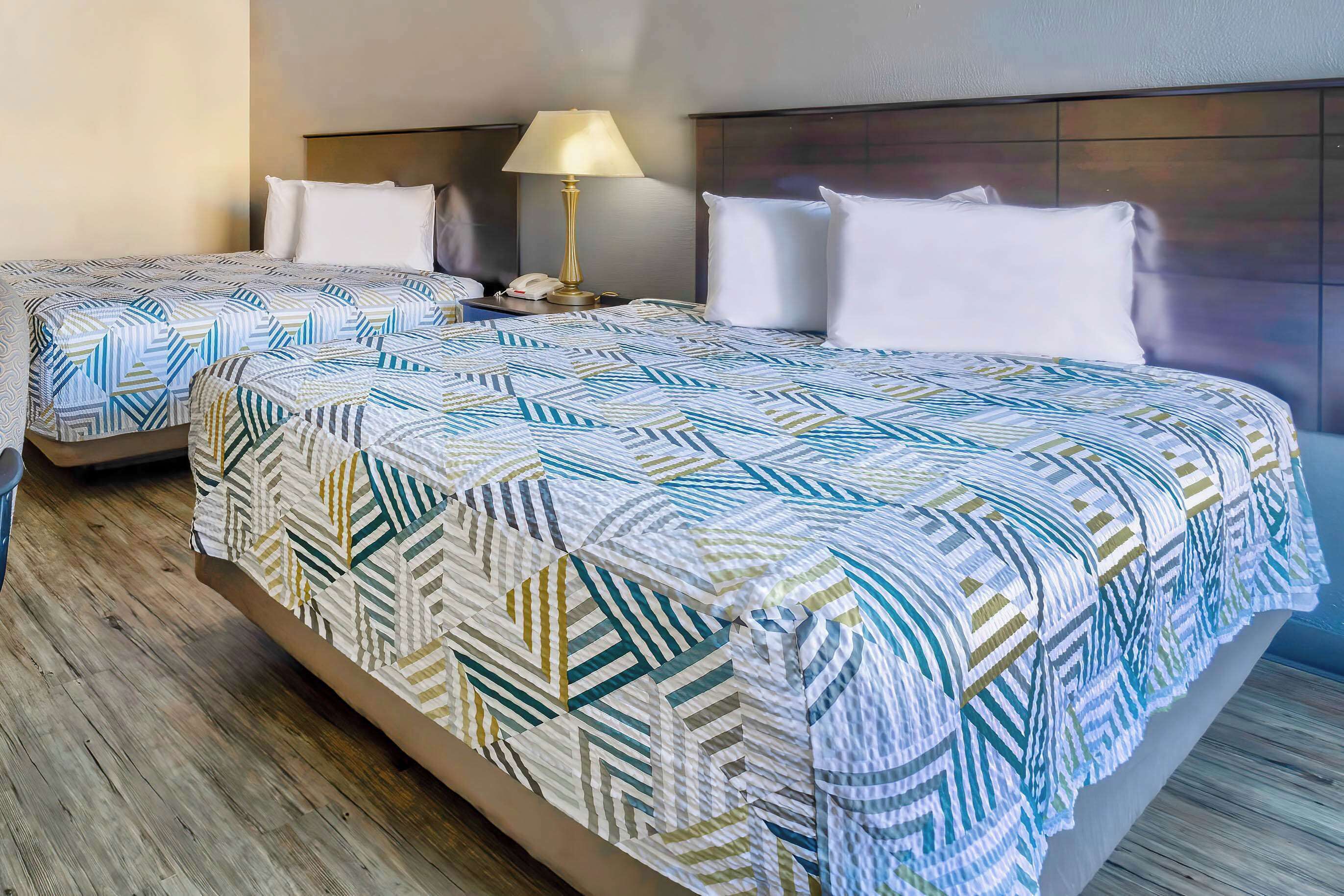 Standard Room, 2 Queen Beds, Non Smoking, Refrigerator & Microwave | Individually furnished, desk, laptop workspace, blackout drapes