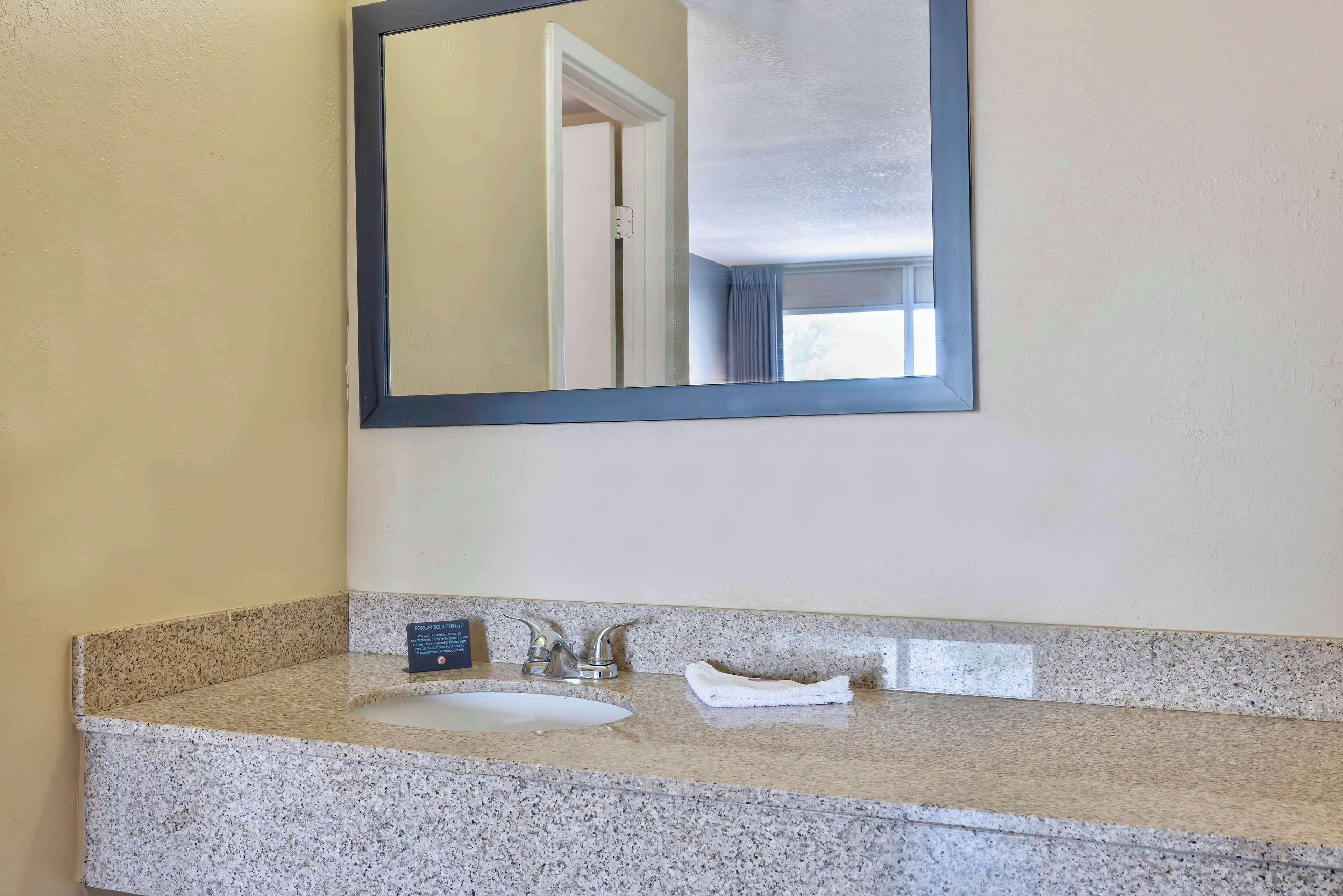 Combined shower/tub, hair dryer, towels, soap