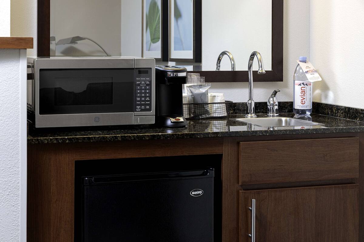 premium bedding, desk, blackout curtains, iron/ironing board