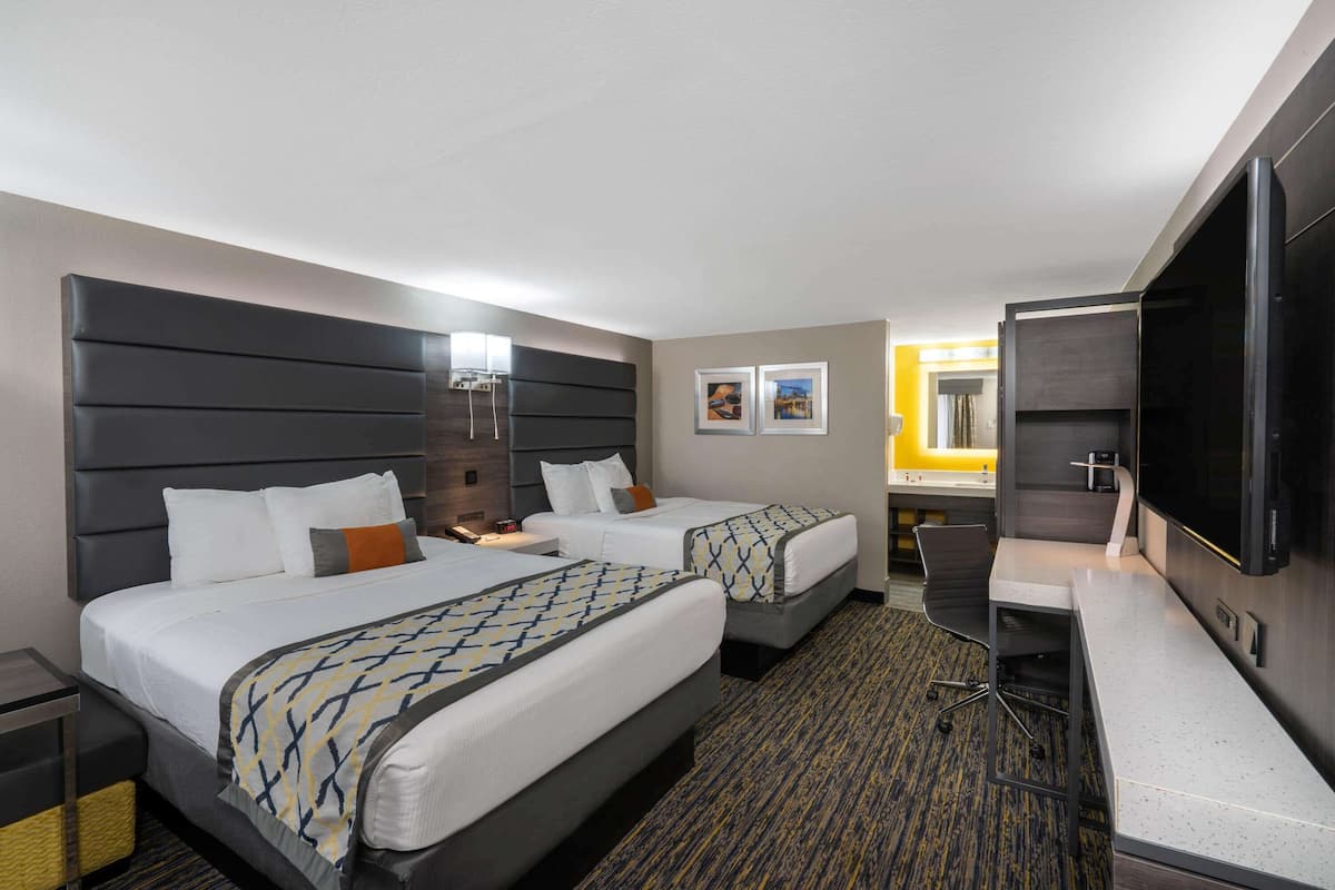 Down duvets, pillow-top beds, desk, laptop workspace