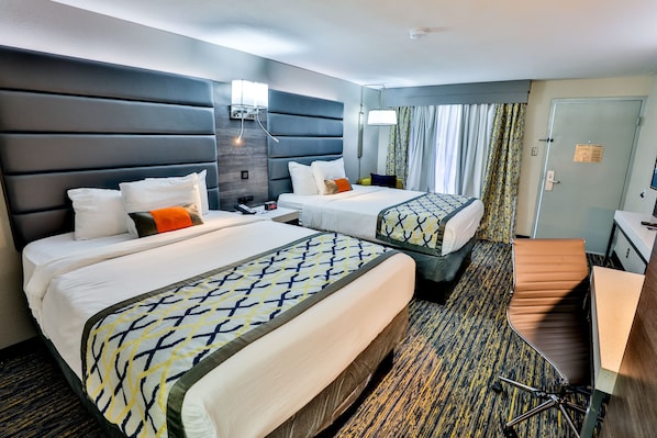 Down duvets, pillow-top beds, desk, laptop workspace