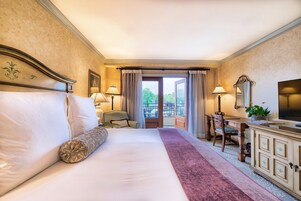 Premium bedding, down comforters, pillowtop beds, minibar