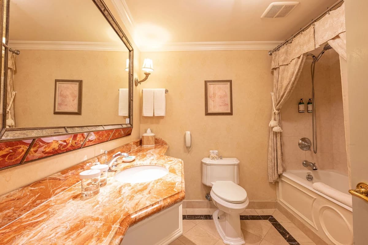 combined shower/bathtub, deep-soaking bathtub, rainfall showerhead