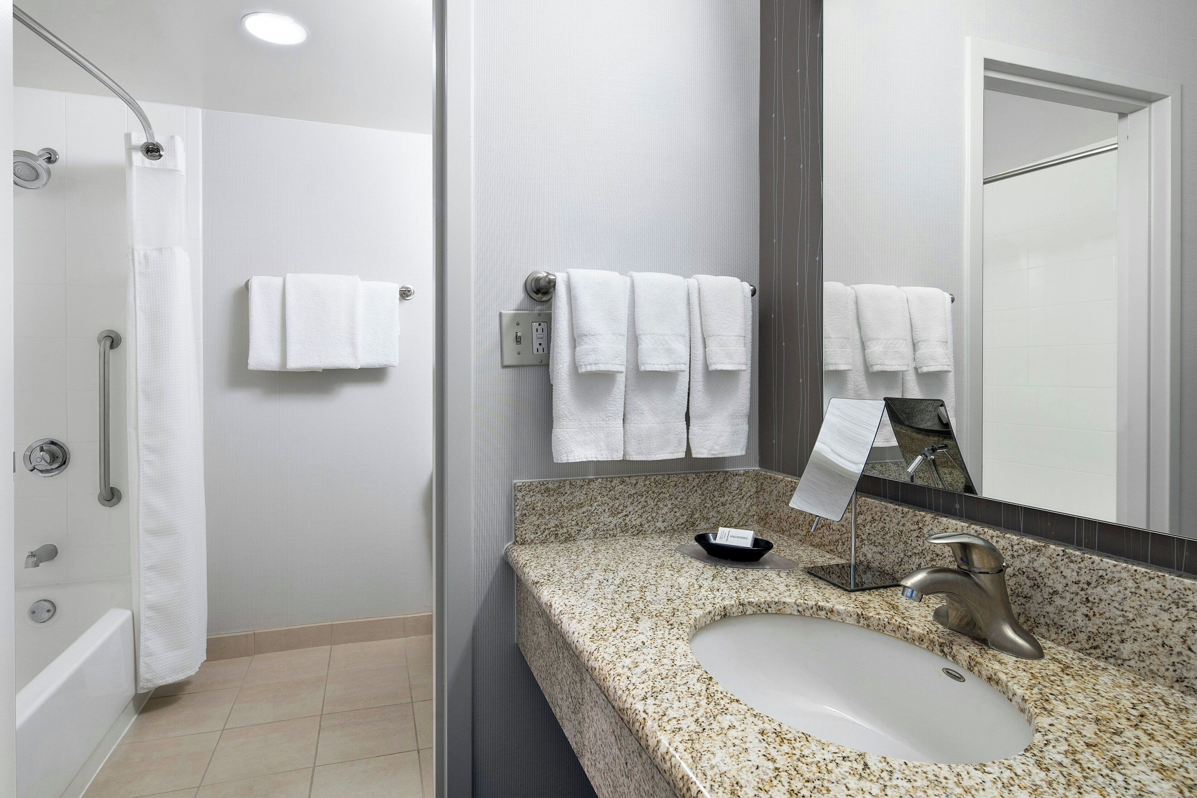 combined shower/bathtub, free toiletries, hair dryer, towels