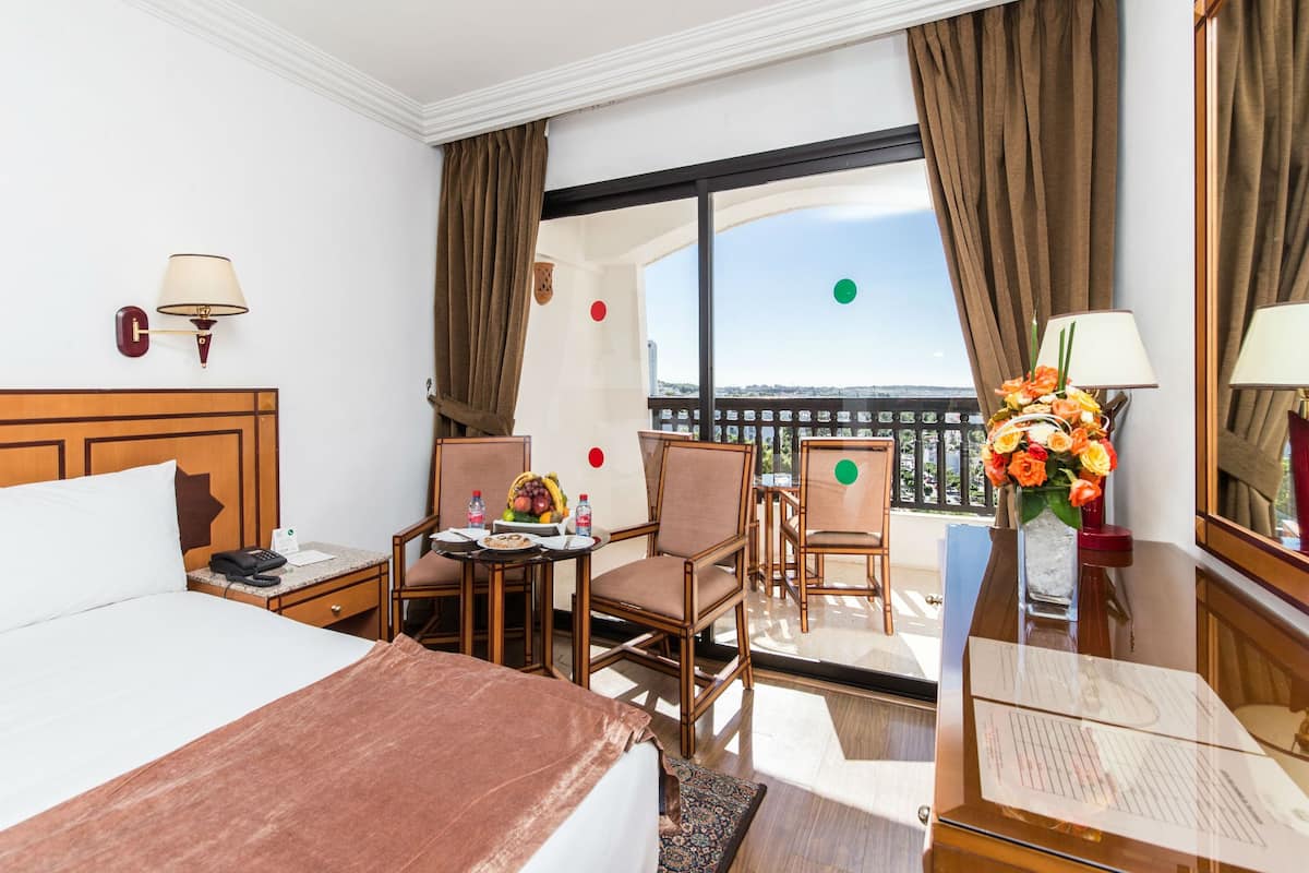 Premium bedding, memory-foam beds, minibar, in-room safe