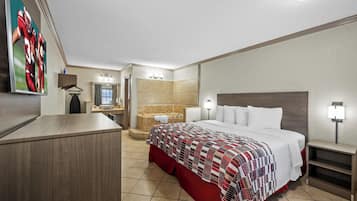 Deluxe Room, 1 King Bed, Non Smoking, Jetted Tub | Desk, laptop workspace, iron/ironing board, free cribs/infant beds