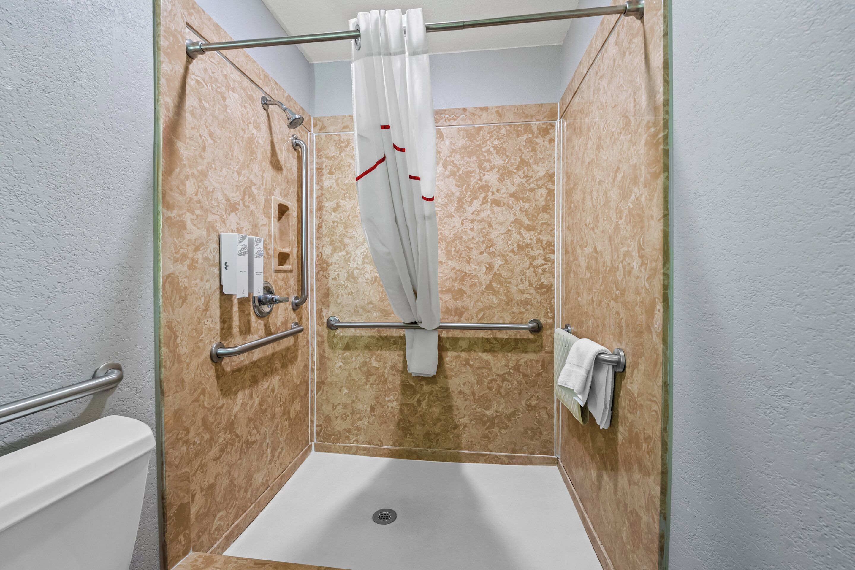 Hair dryer, towels, soap, shampoo