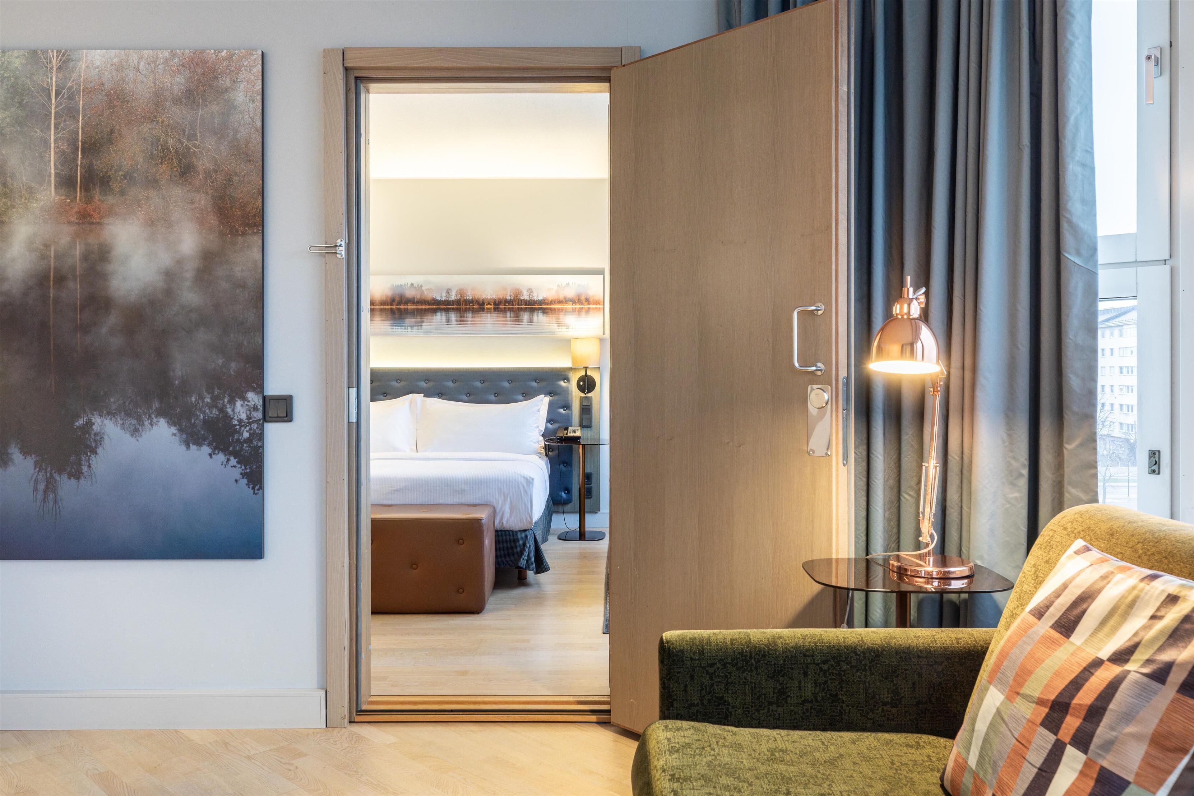 Suite, 1 King Bed, Sea View | Living area | 42-inch TV with satellite channels, heated floors