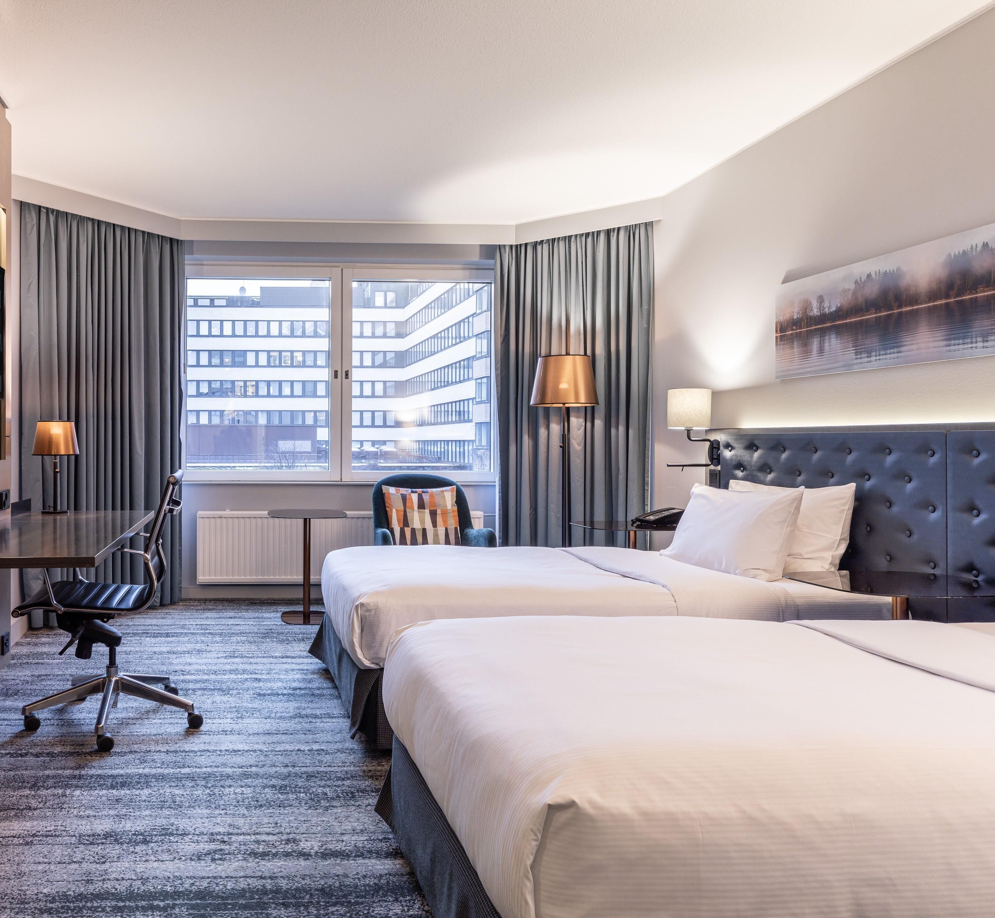 premium bedding, down duvets, minibar, in-room safe