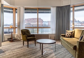 Presidential Suite | Living area | 42-inch TV with satellite channels, heated floors - Hilton Helsinki Strand (Helsinki)