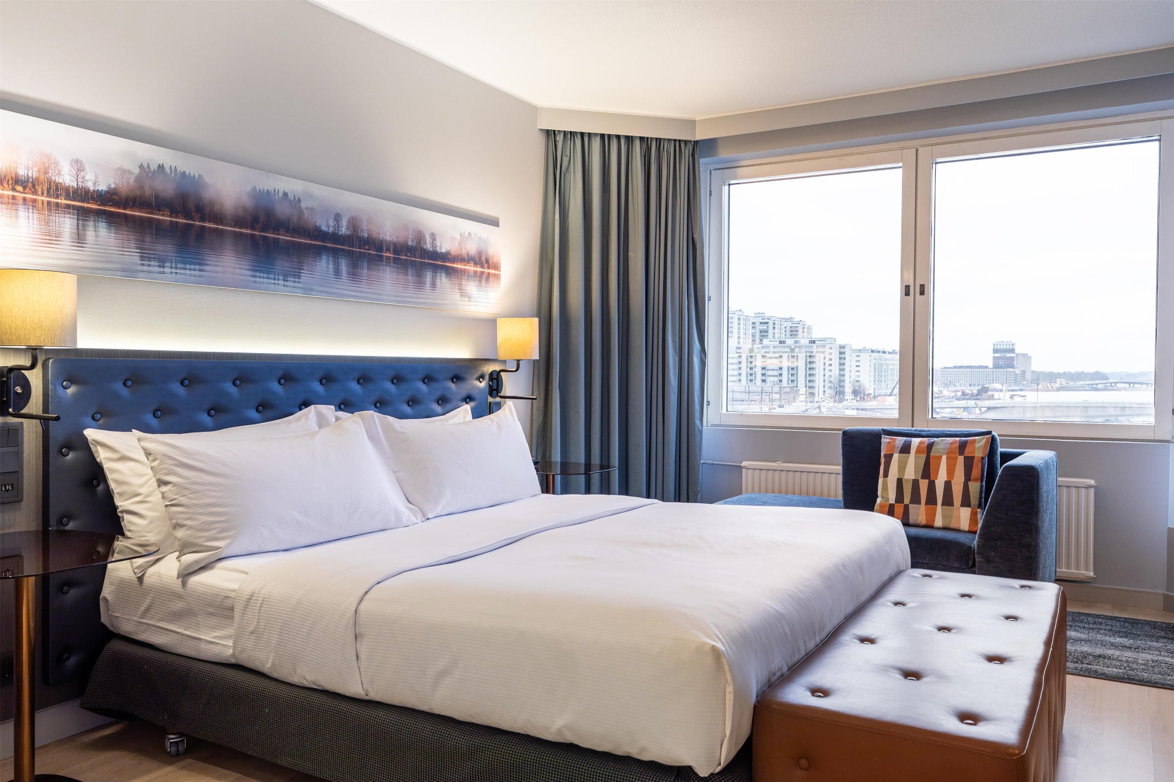 Suite, 1 King Bed, Sea View | Living area | 42-inch TV with satellite channels, heated floors