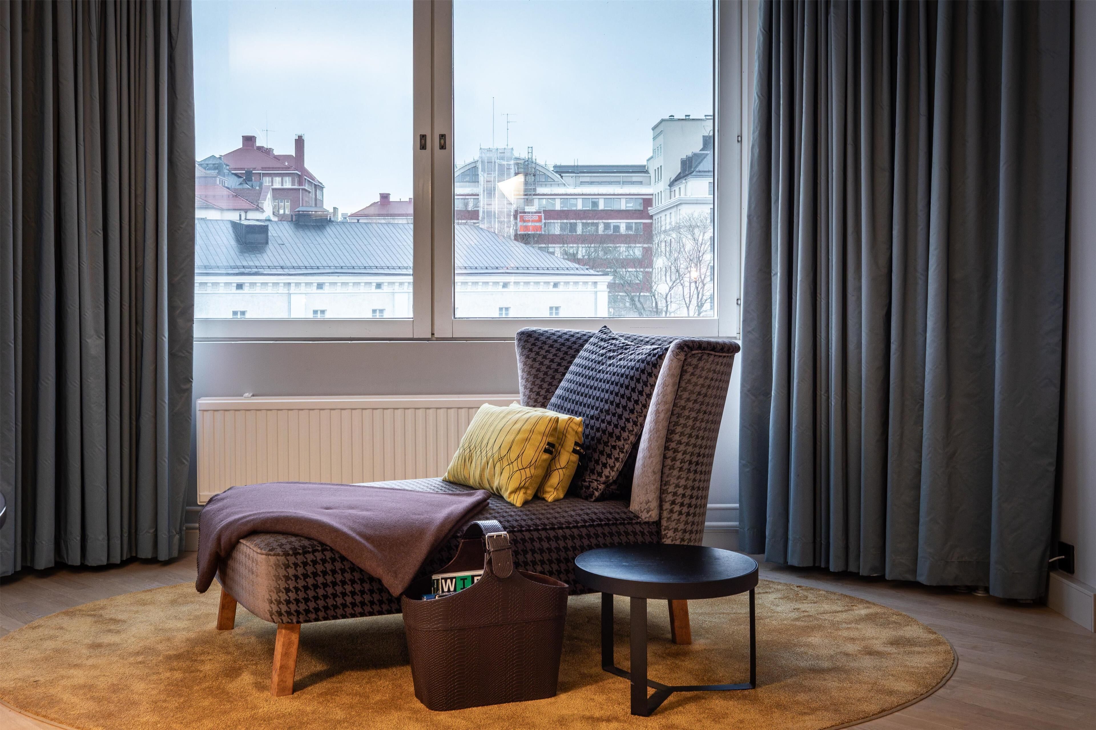 suite, 1 king bed, sea view | living area | 42-inch tv with satellite channels, heated floors