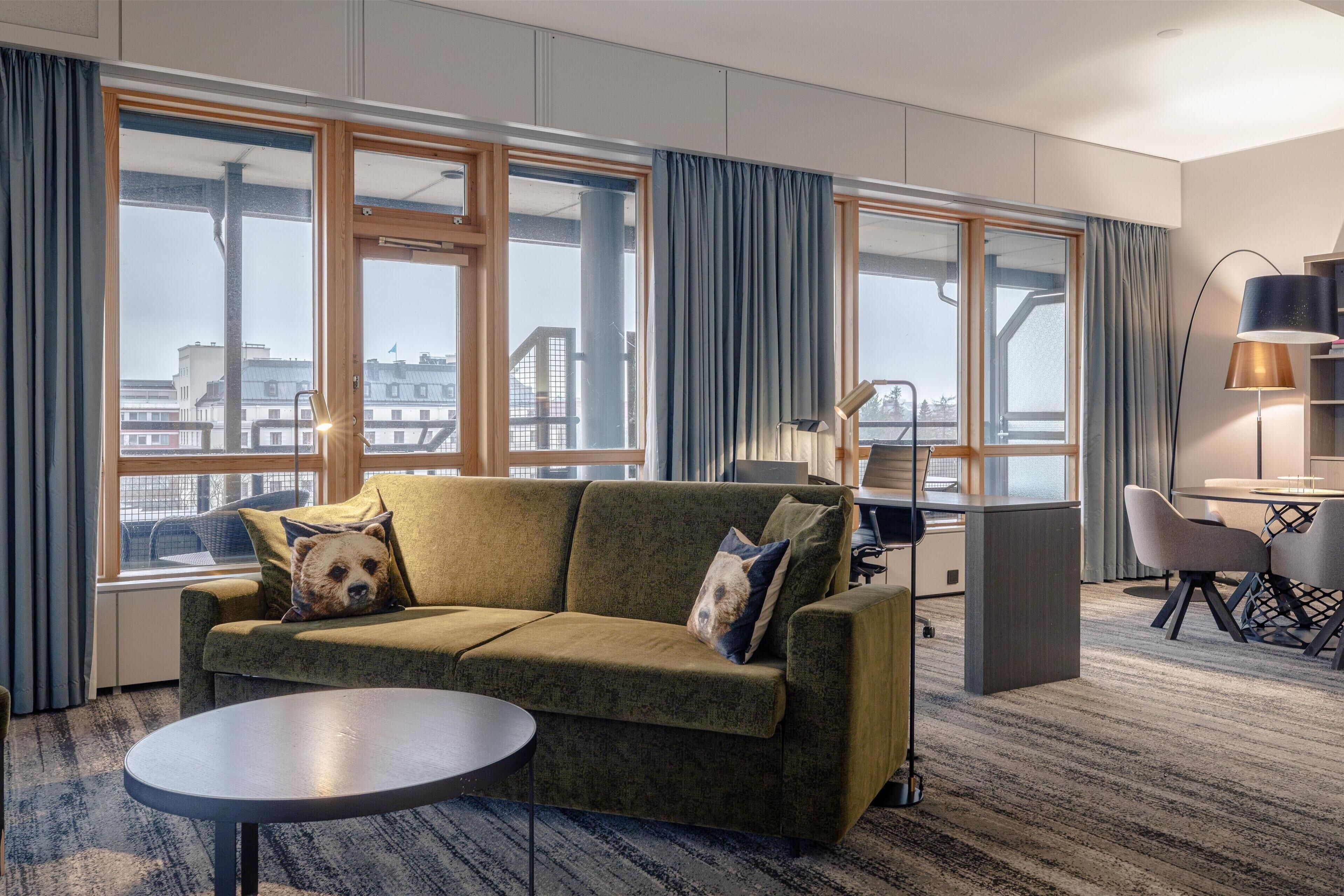 presidential suite | living area | 42-inch tv with satellite channels, heated floors