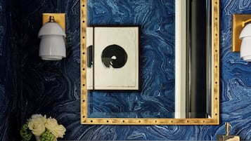 Premium bedding, down comforters, pillowtop beds, in-room safe
