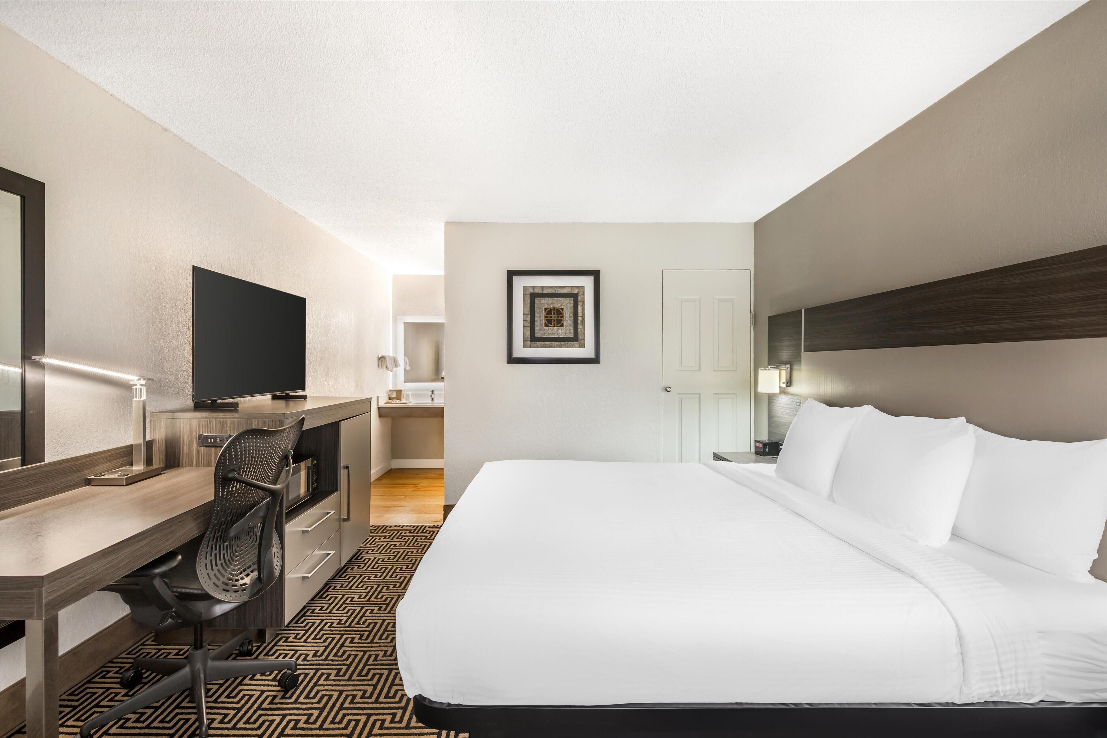 standard room, 1 king bed, accessible, bathtub | premium bedding, pillow-top beds, desk, laptop workspace