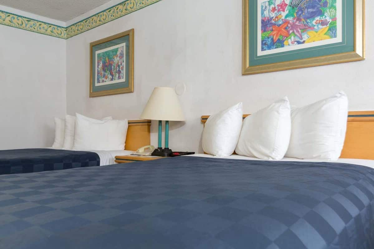 Premium bedding, pillow-top beds, desk, blackout curtains