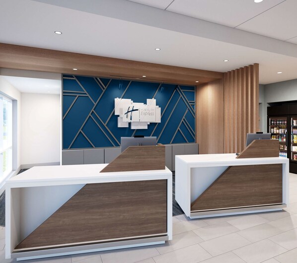 A reception desk with a modern design, a blue geometric wall, and a wooden accent wall.