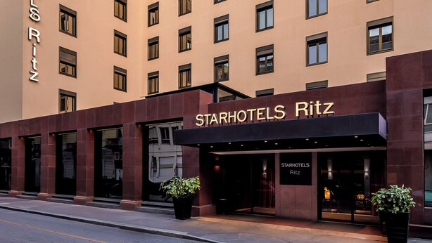 A StarHotels Ritz building with a modern facade, multiple windows, and a prominent entrance.