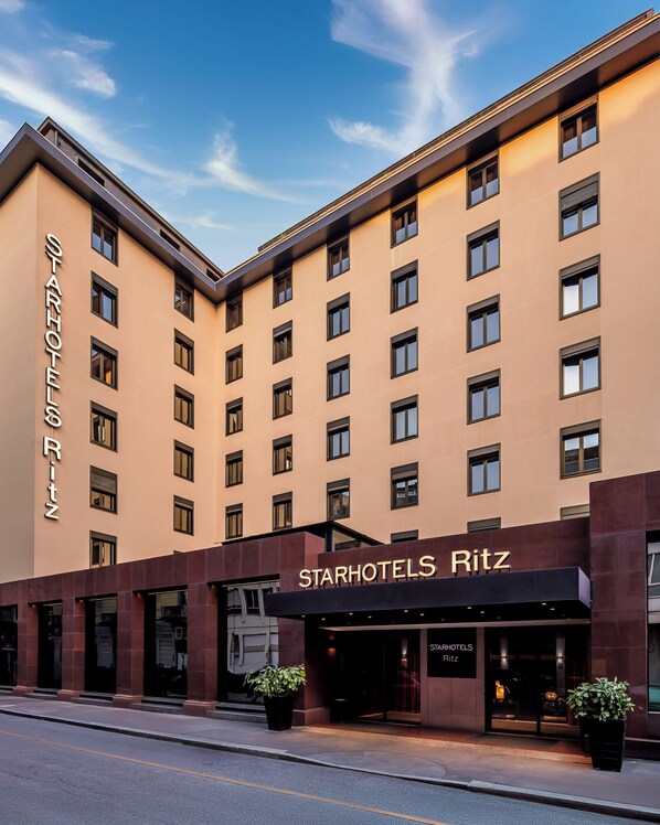 A StarHotels Ritz building with a modern facade, multiple windows, and a prominent entrance.