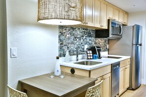 Full-size fridge, microwave, coffee/tea maker, freezer