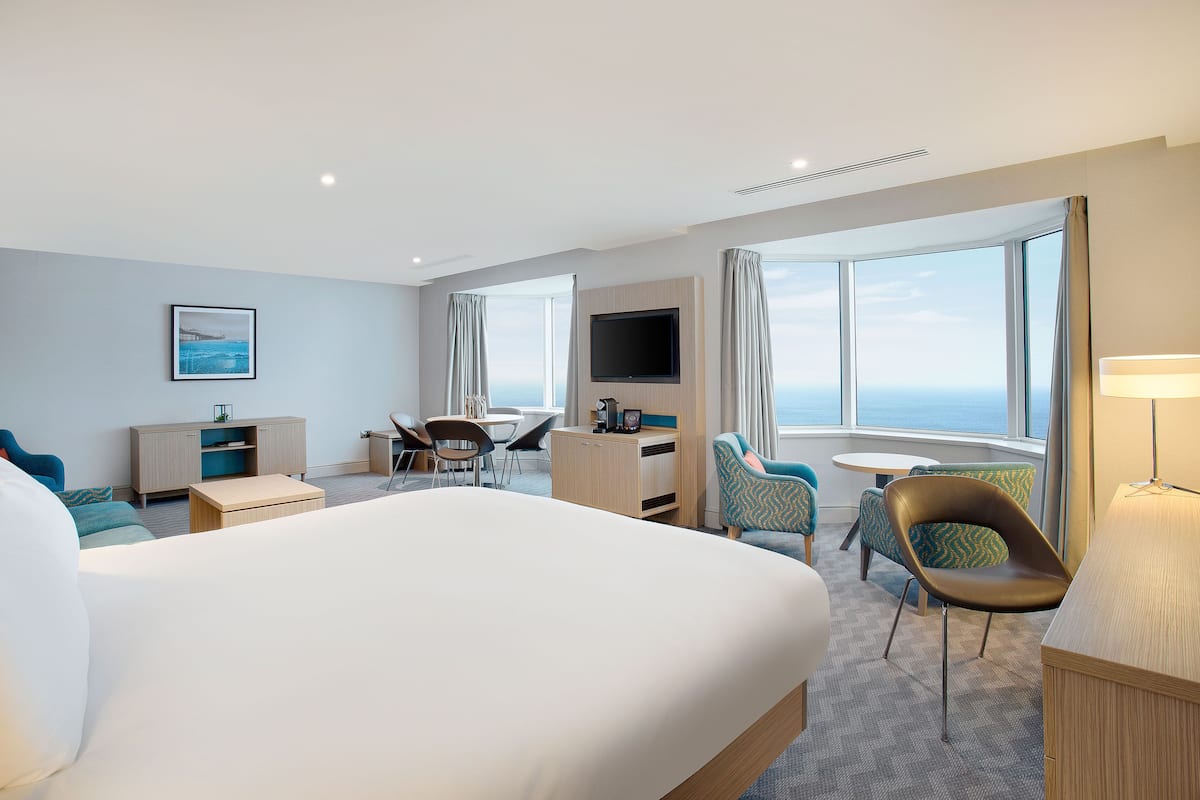 junior studio suite, sea view | in-room safe, desk, iron/ironing board, free wifi