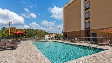 Seasonal outdoor pool, pool umbrellas, sun loungers