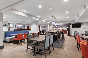Enjoy meals in a spacious dining area with comfortable seating options and a convenient counter.