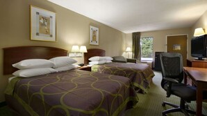 A hotel room with two beds, a desk with a computer, and a TV. - Super 8 by Wyndham Calhoun (Calhoun)