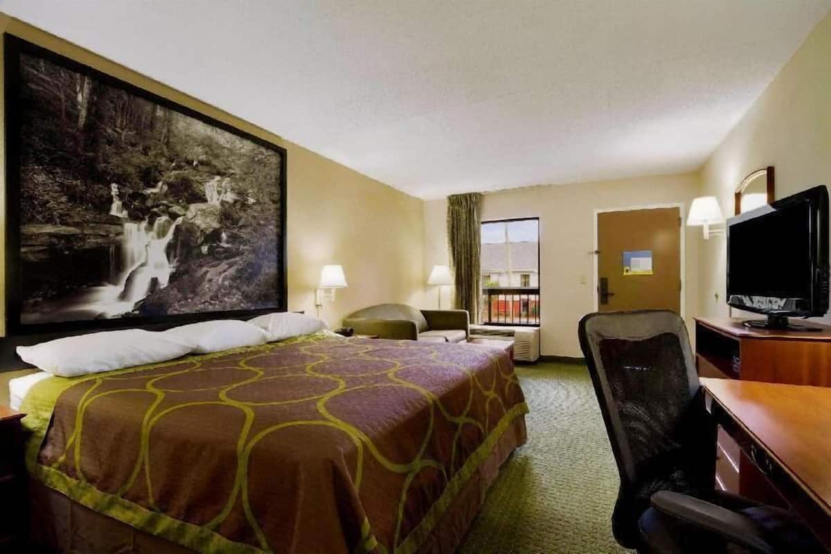 Desk, laptop workspace, blackout curtains, iron/ironing board