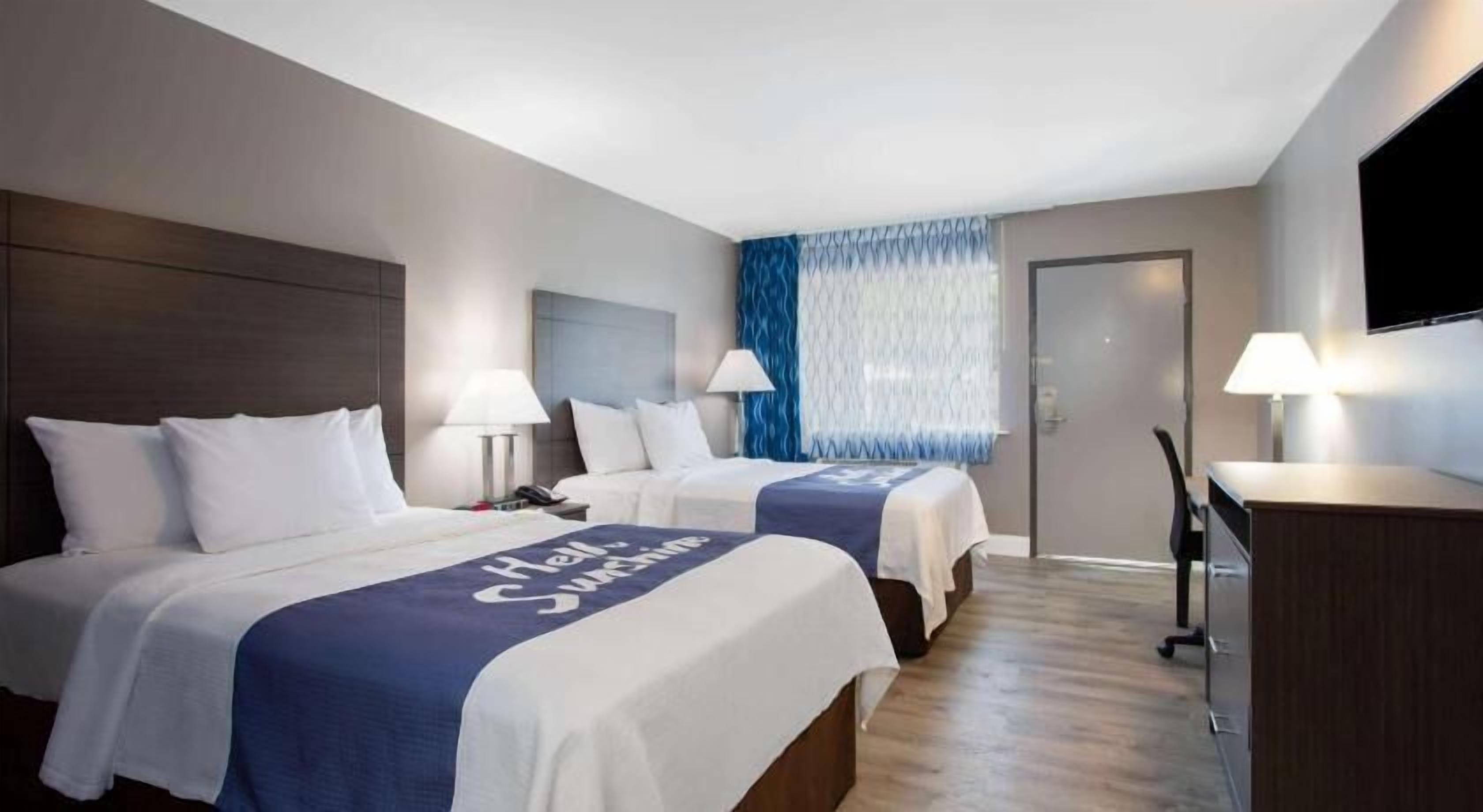 Premium bedding, down duvets, desk, blackout curtains