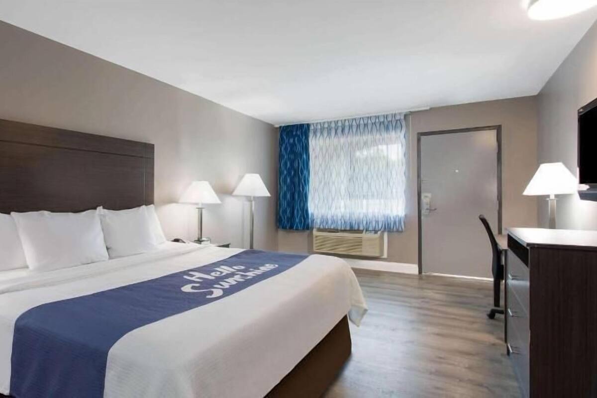 Premium bedding, down comforters, desk, blackout drapes