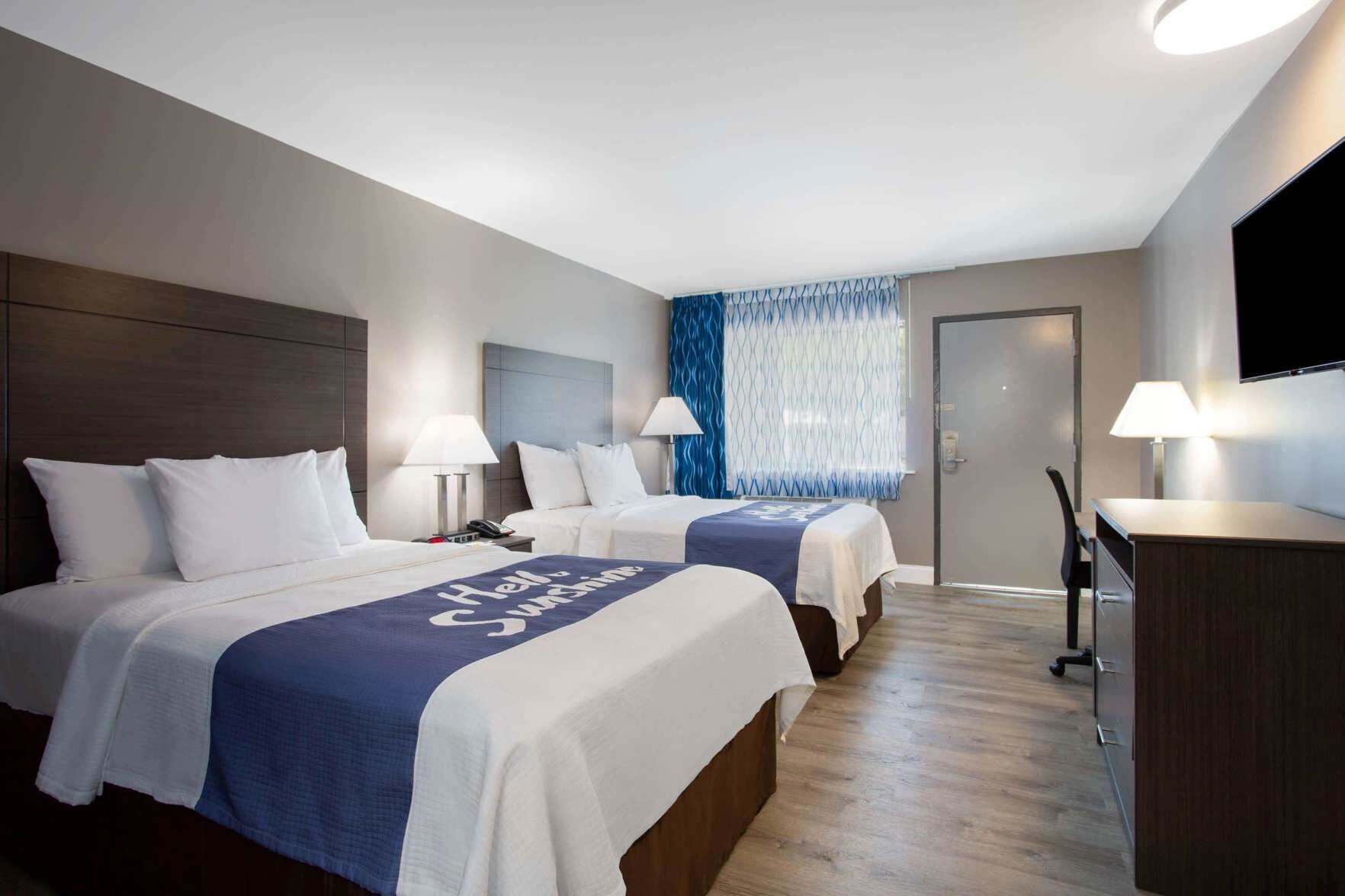 Premium bedding, down duvets, desk, blackout curtains