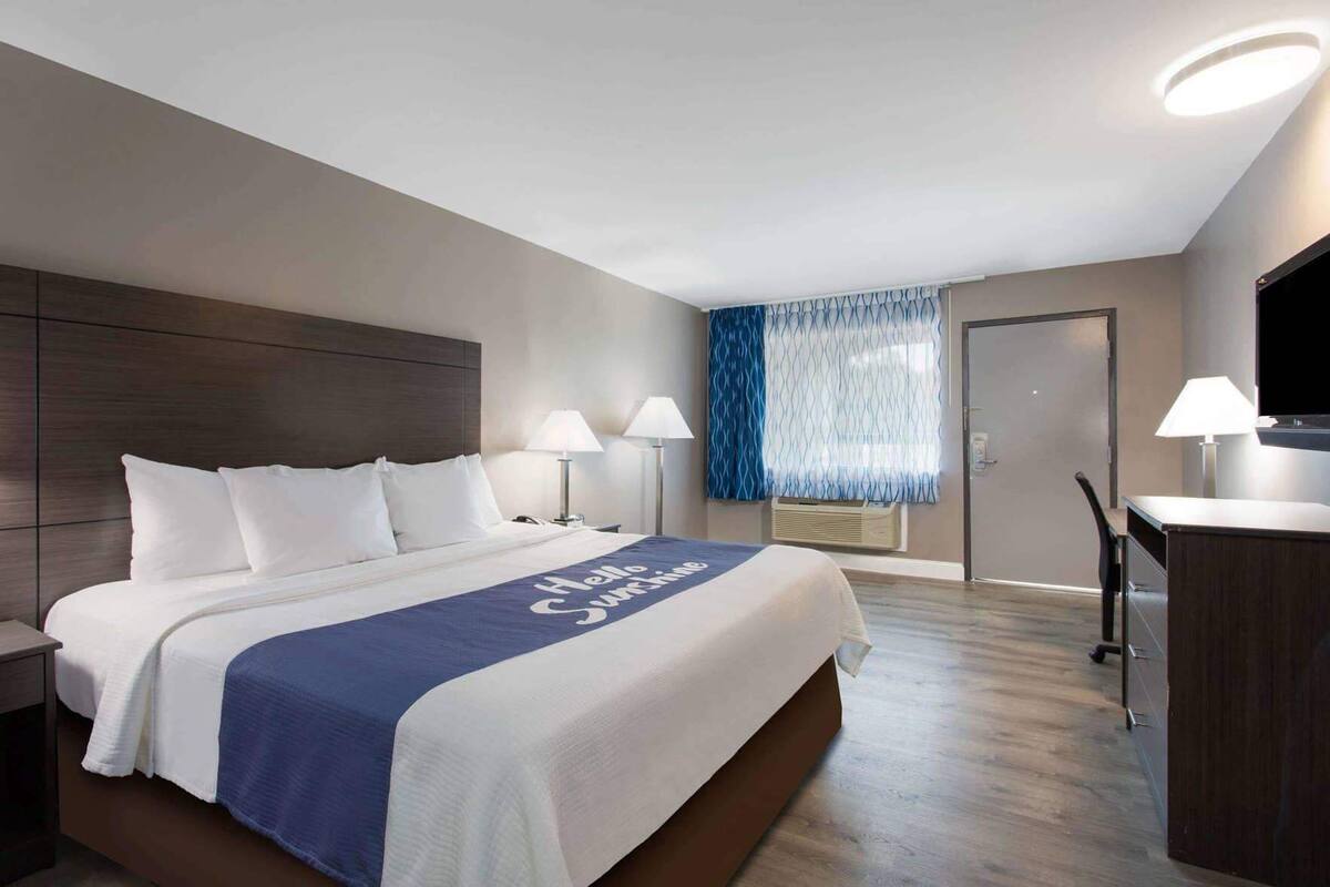 Premium bedding, down comforters, desk, blackout drapes