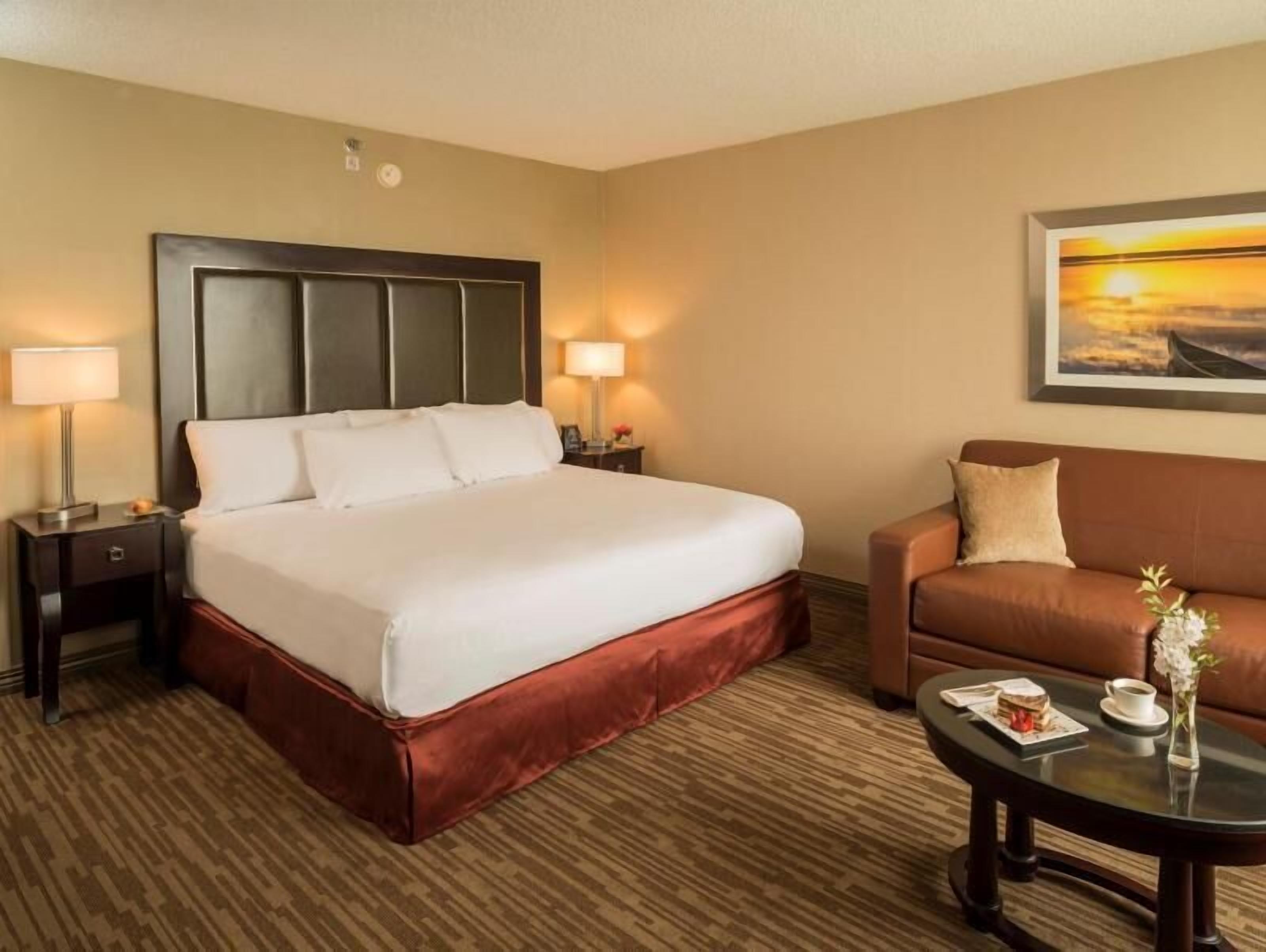 Down duvets, pillow-top beds, in-room safe, desk