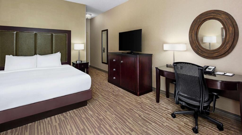 Down duvets, pillow-top beds, in-room safe, desk