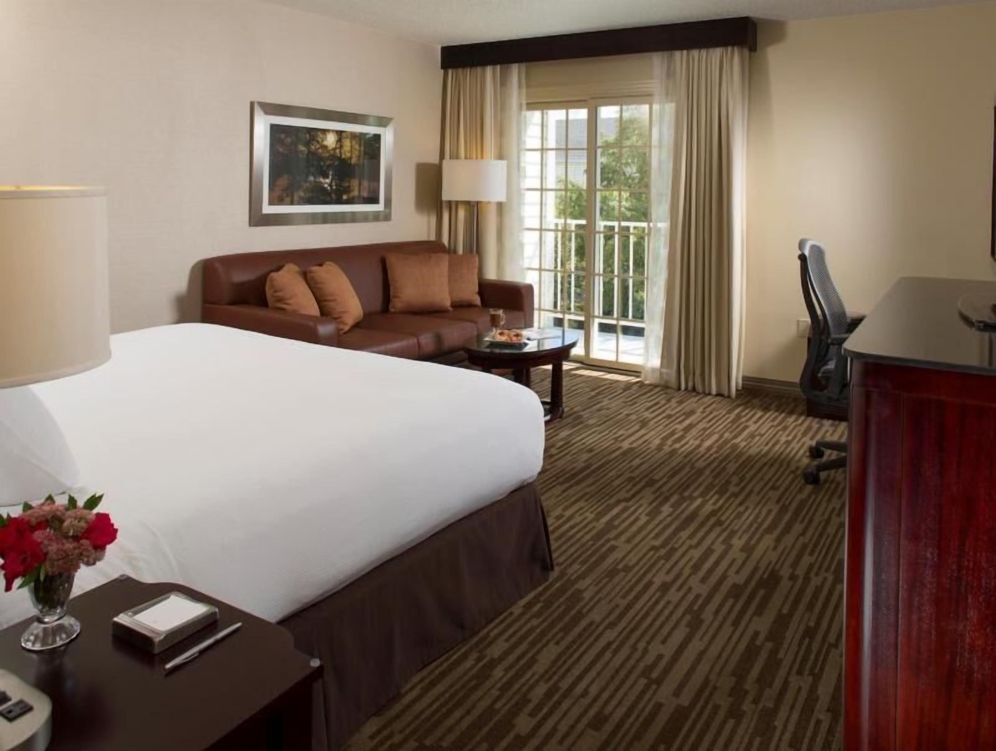 Down duvets, pillow-top beds, in-room safe, desk