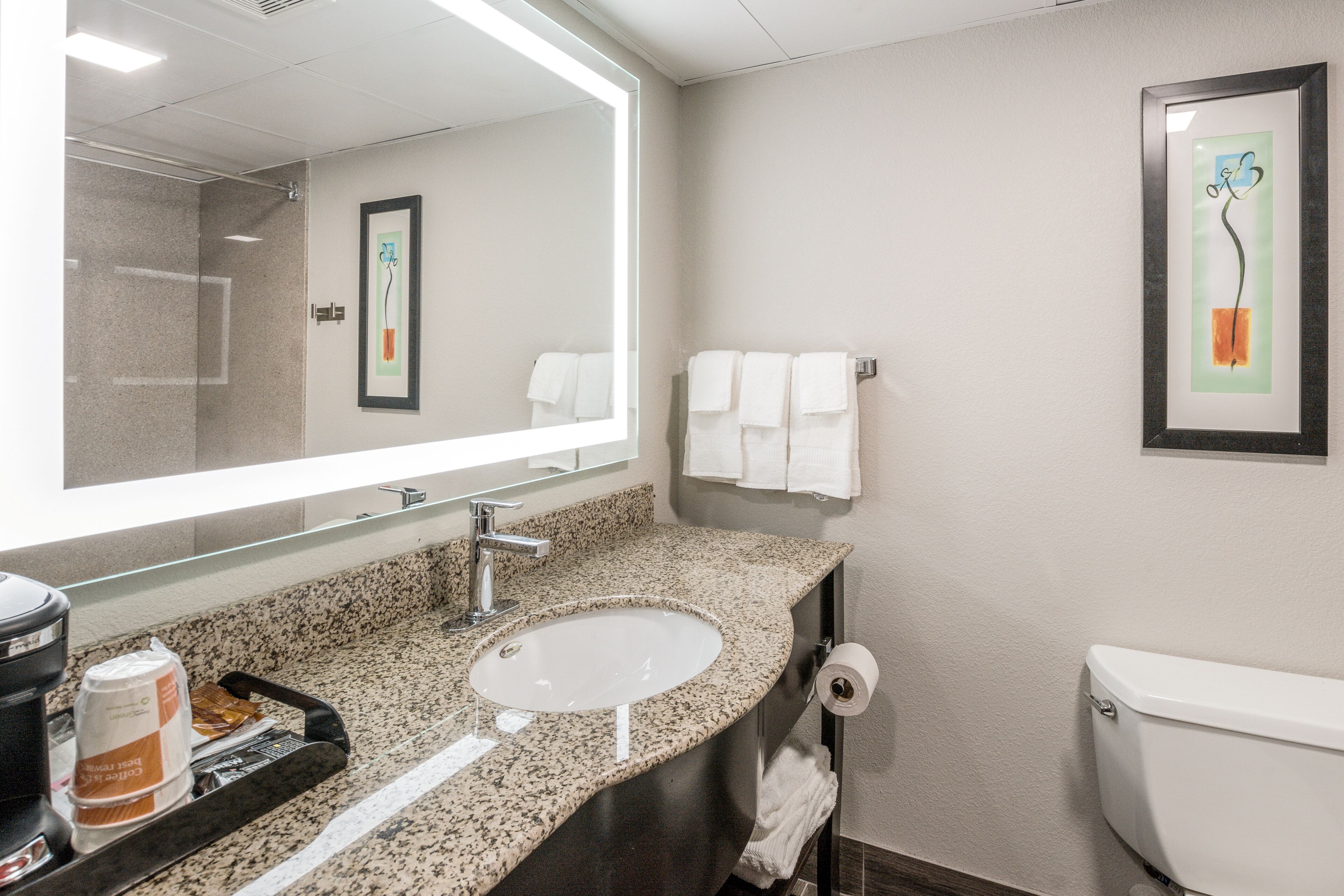 premium bedding, pillow-top beds, desk, laptop workspace