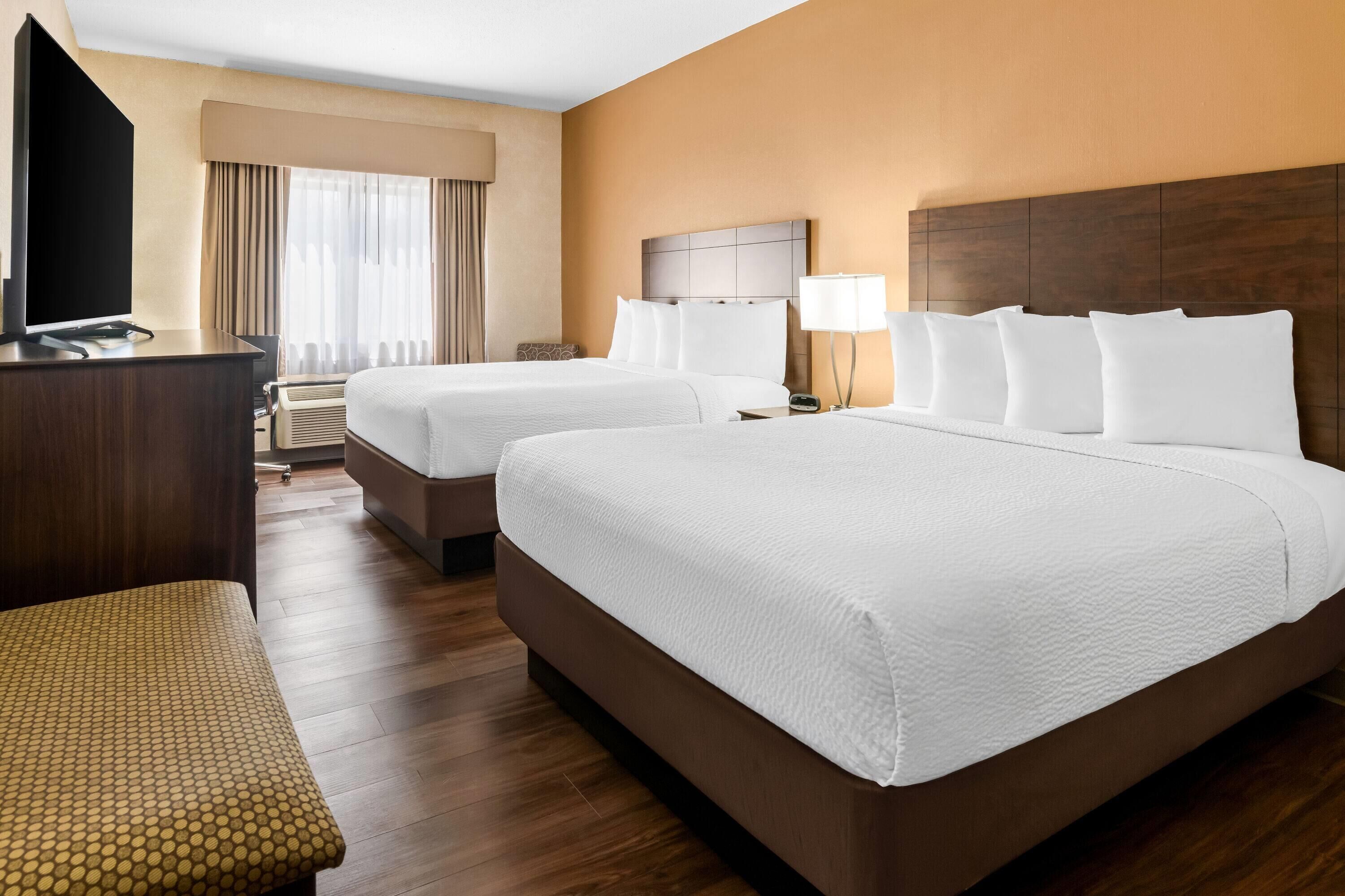 Standard Room, 2 Queen Beds | Desk, laptop workspace, blackout curtains, iron/ironing board