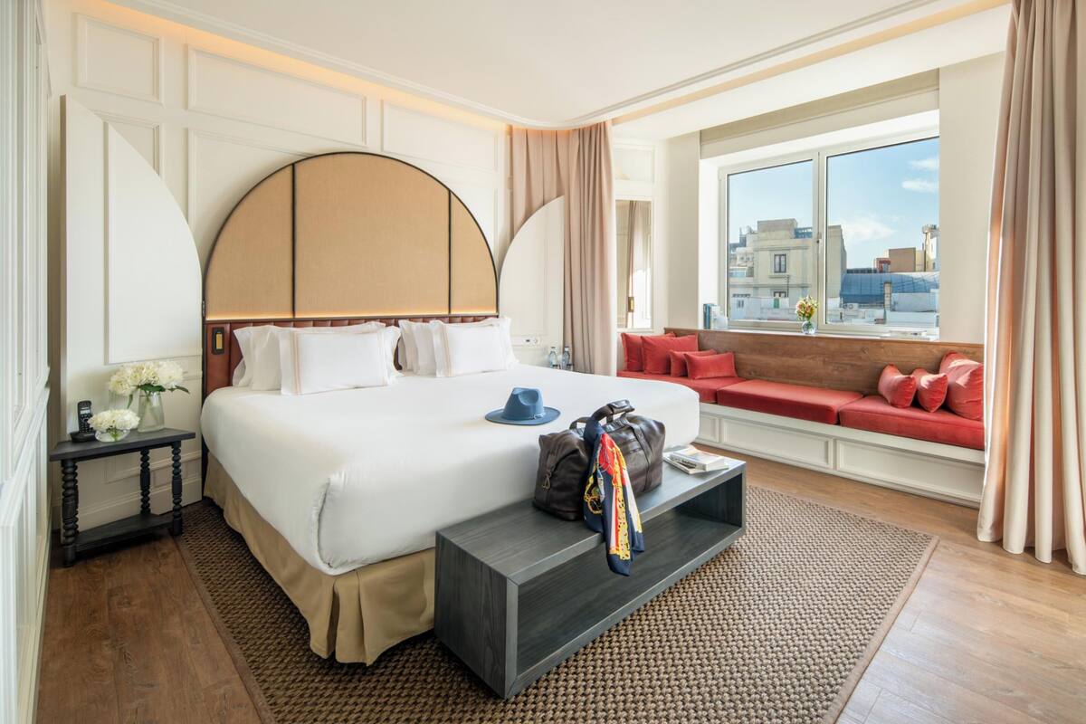 Premium bedding, down duvets, memory-foam beds, in-room safe
