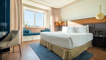 Premium bedding, down comforters, memory foam beds, in-room safe