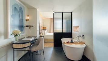 Premium bedding, down comforters, memory foam beds, in-room safe