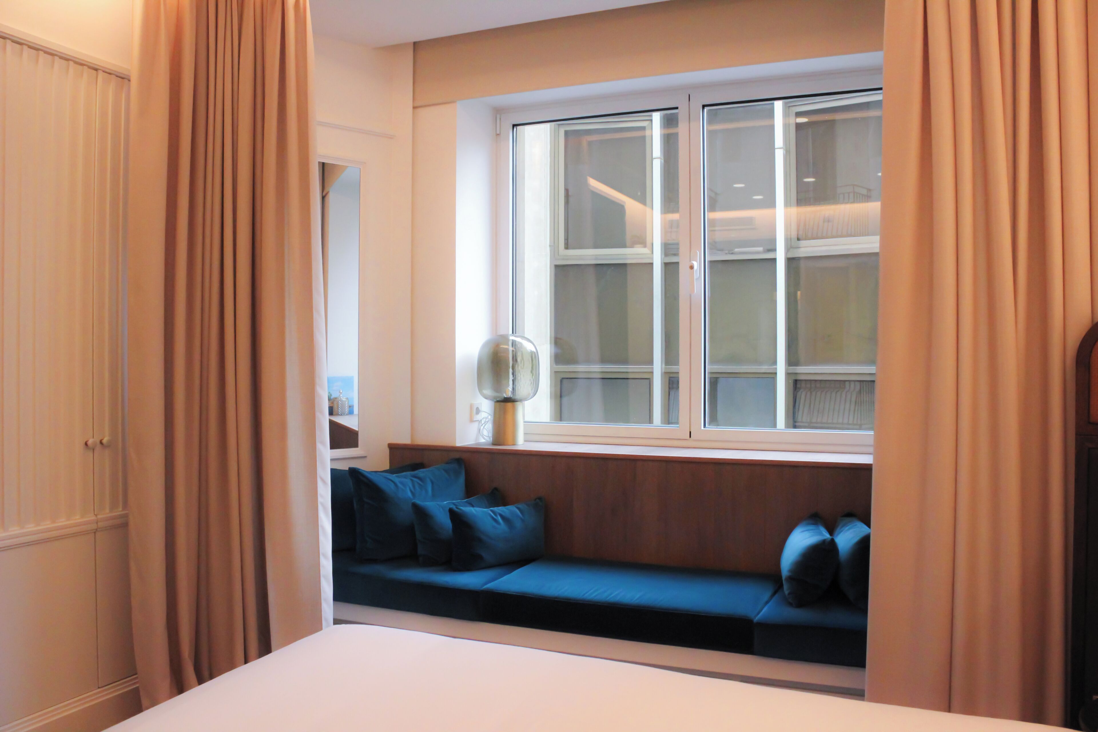 Premium bedding, down comforters, memory foam beds, in-room safe