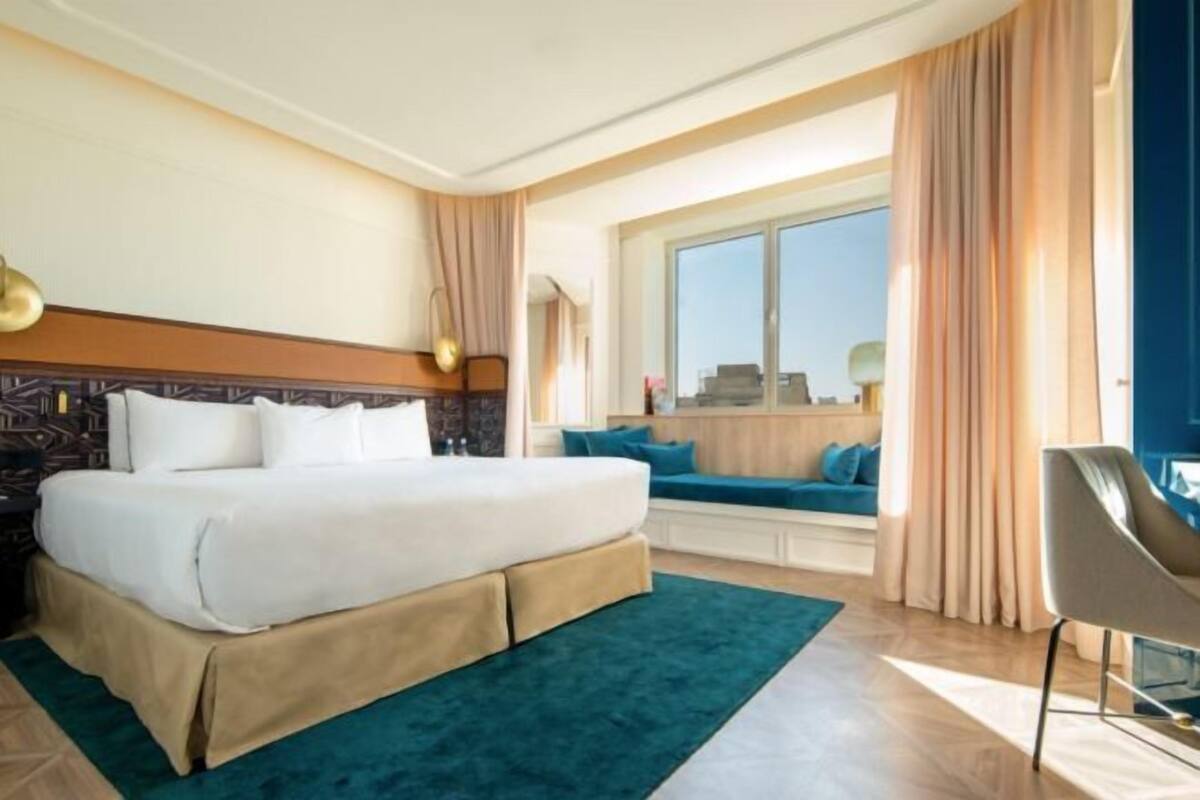 Premium bedding, down comforters, memory foam beds, minibar