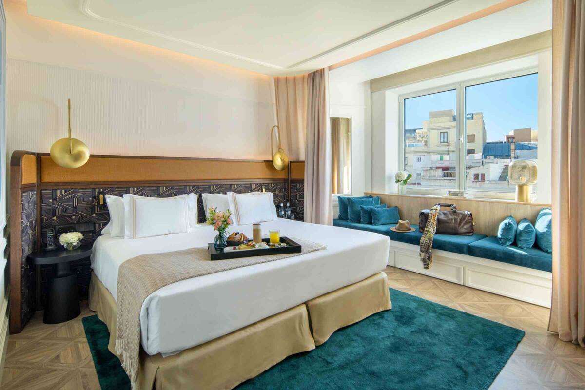 Premium bedding, down duvets, memory-foam beds, in-room safe