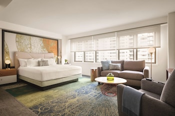 Junior Suite, 1 King Bed | Premium bedding, in-room safe, desk, laptop workspace at The Gardens Sonesta ES Suites New York