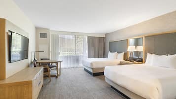 Habitación Deluxe, 2 camas de matrimonio | Ropa de cama de alta calidad y colchones con acolchado adicional